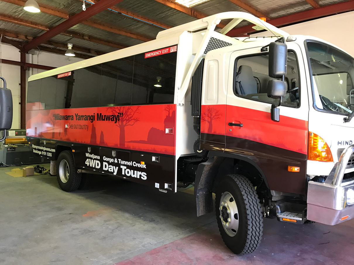 Milawarra Yarrangi Muwayi 4WD charter bus on a Kimberley road