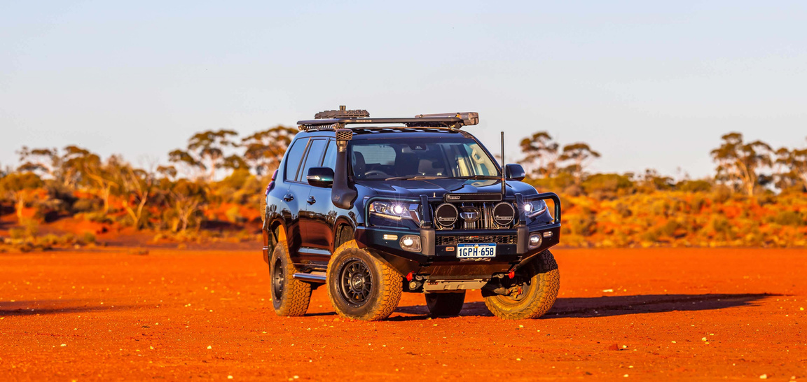 Toyota LandCruiser 150 Series on red dirt
